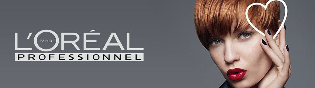 A woman with long hair is standing in front of the channel logo.